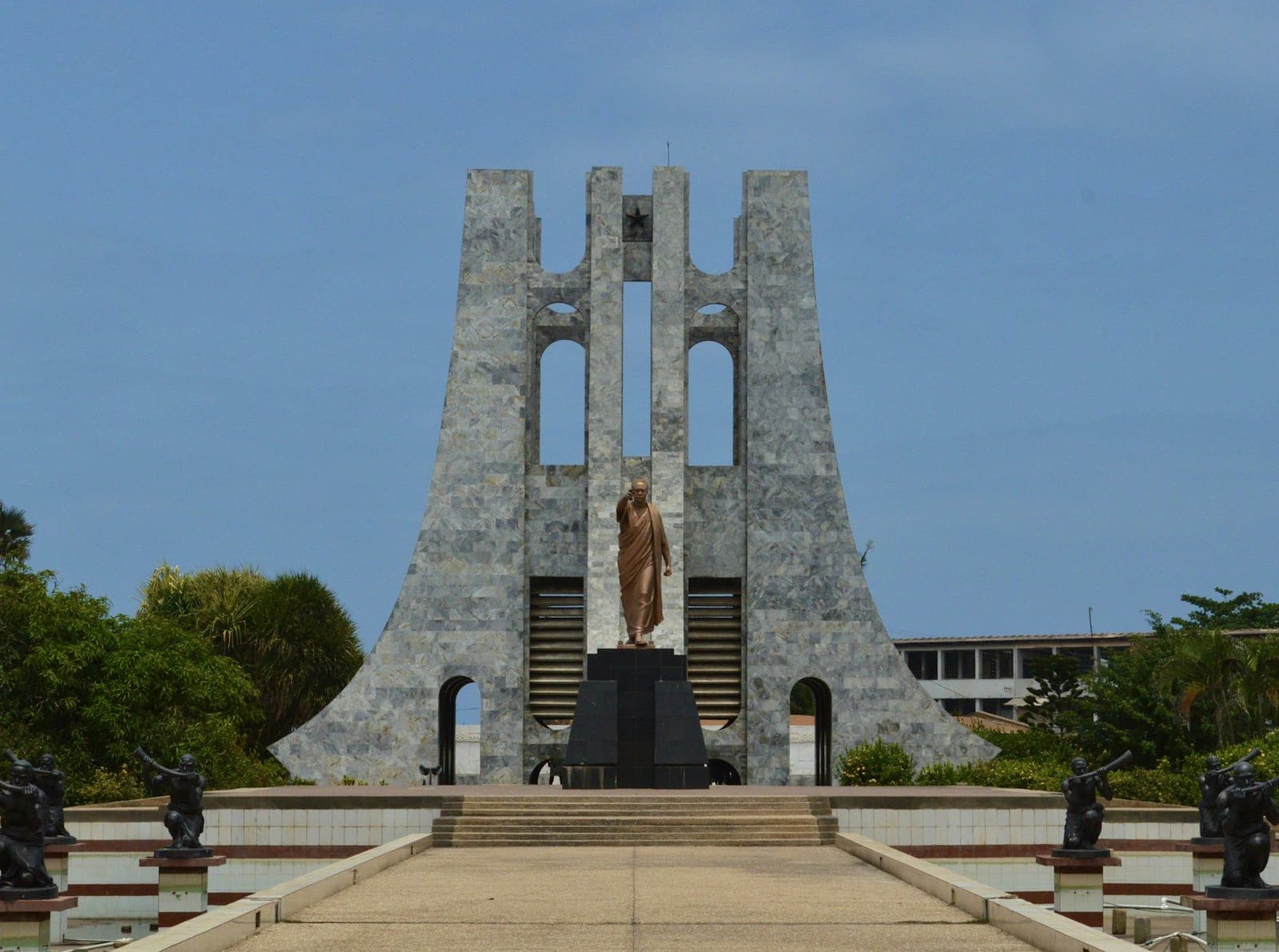 The Kwame Nkrumah Memorial Park in Accra, with the mausoleum, the statue of Kwame Nkrumah and a walkway lined with bronze figures
